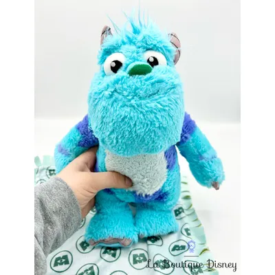 Peluche Sulli Monstres et Cie Disney Babies Disneyland Paris monstre bleu couffin couverture
